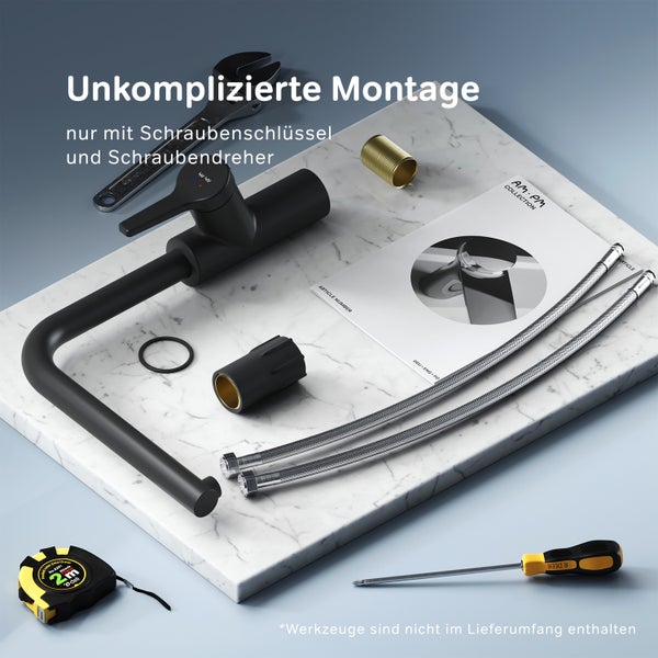 Küchenarmatur Set zur einfachen Montage mit Montageanleitung, Anschlussschläuchen und Zubehörteilen auf einer Marmorplatte.