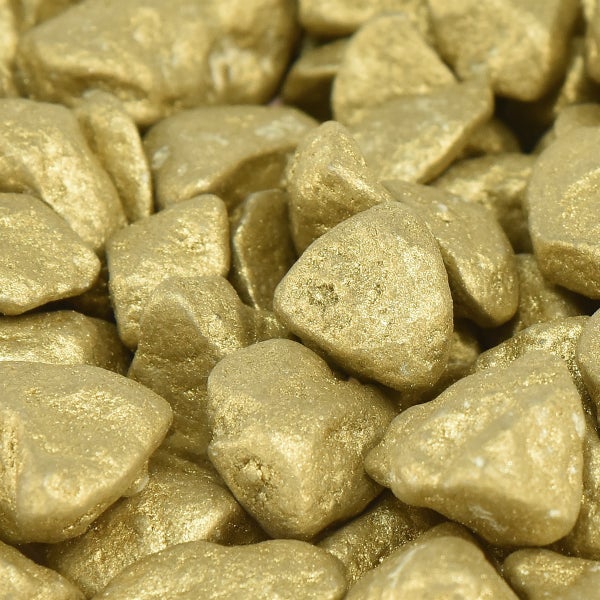 Goldfarbener Dekokies in einem transparenten Kunststoffbeutel für Dekorationszwecke.