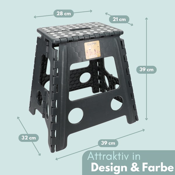 Grauer Klapphocker aus Kunststoff mit weißen Punkten und den Maßen 28 x 21 x 39 Zentimeter.