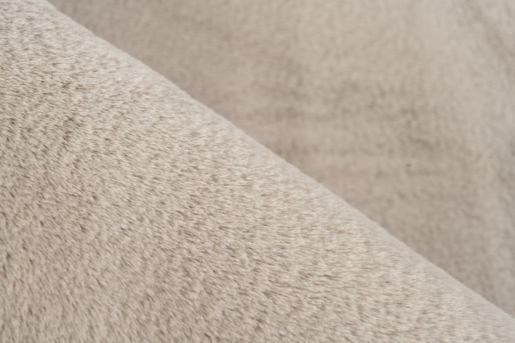 Strukturaufnahme eines weichen Kunstfell Materials für Wohntextilien