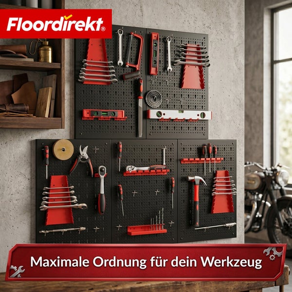 Werkzeugwand aus Metall zur Organisation von Handwerkzeugen wie Schraubenschlüsseln und Hämmern in einer hellen Werkstatt. Floordirekt Logo.