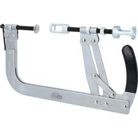 Eine metallene Schnellspannzwinge mit einem Hebelgriff für präzises und schnelles Fixieren von Werkstücken.