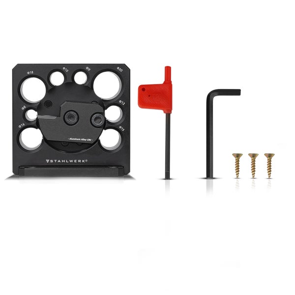 Stahlwerk Dübelmacher Set aus schwarzem CNC-Aluminium mit acht Lochgrößen, rotem Torx-Schlüssel, Sechskantschlüssel und drei goldenen Schrauben.