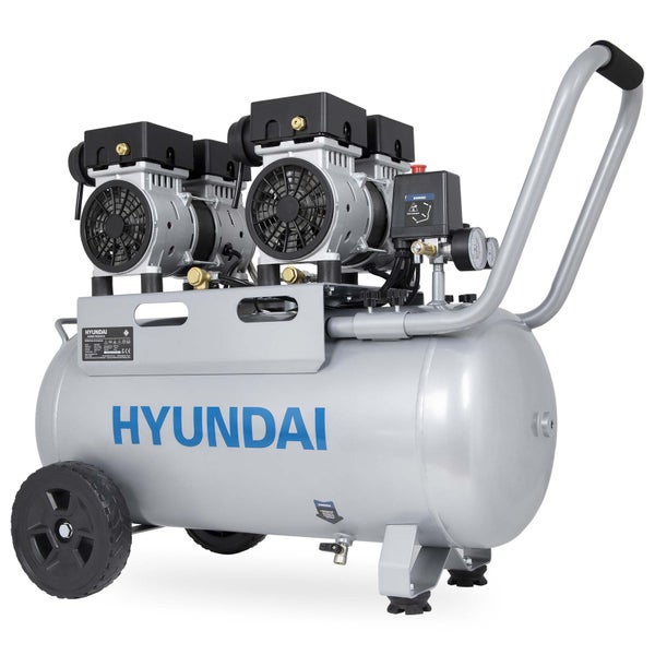 Mobiler Hyundai Kompressor mit zwei Motoreinheiten, Druckmanometern und Transportgriff.