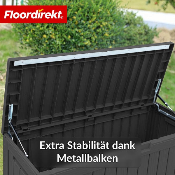 Geöffnete Gartenbox aus Kunststoff mit Metallbalken für zusätzliche Stabilität