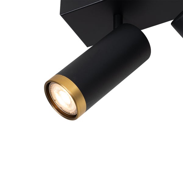 Schwarzer Deckenspot mit goldfarbenem Detail