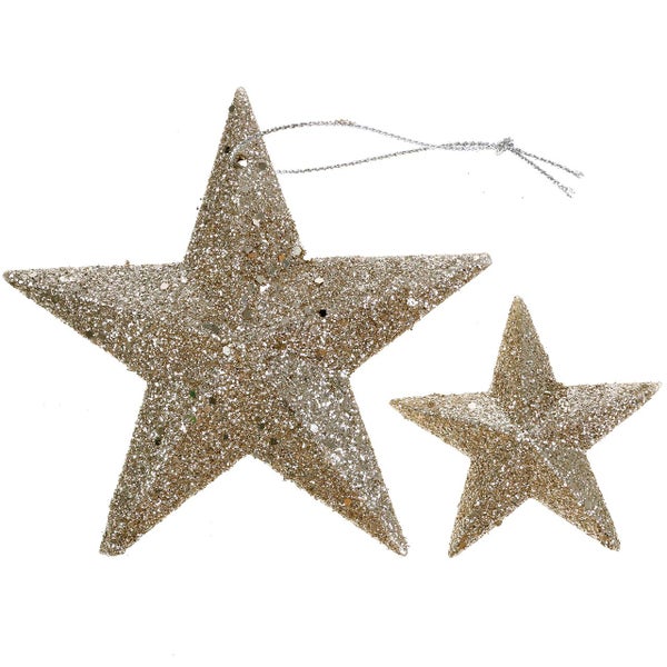 Zwei glitzernde Sterne als Weihnachtsbaumschmuck