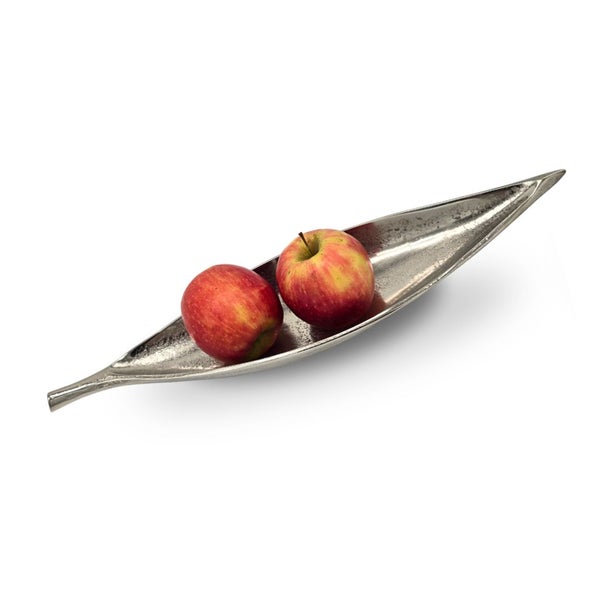 Silberfarbene Dekoschale in Blattform aus Metall mit zwei Äpfeln.