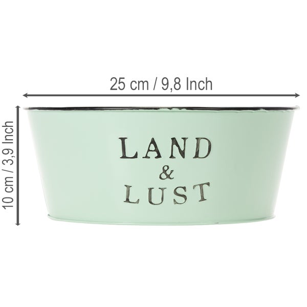 Hellgrüne Dekoschale aus Metall mit Aufschrift Land und Lust, Durchmesser 25 Zentimeter, Höhe 10 Zentimeter.