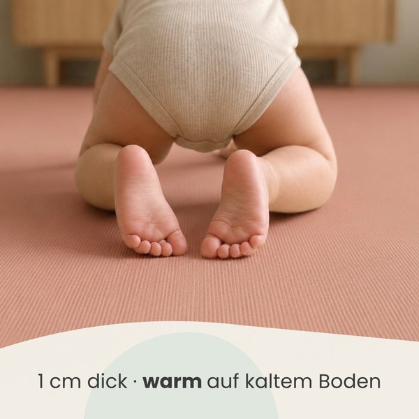 Krabbelmatte mit 1 Zentimeter Dicke als warmer Untergrund für Kinder auf kühlen Böden.