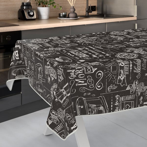 Tischdecke mit Kaffeehaus-Motiv auf einem Küchentisch