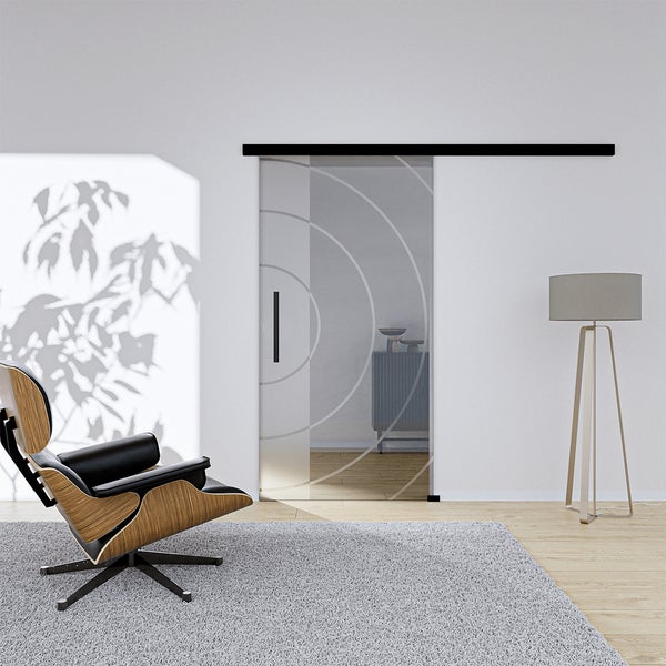 Wohnraum mit Glasschiebetür und Kreismuster