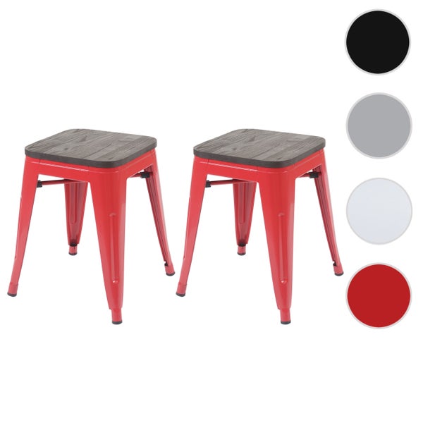Zwei rote Hocker mit Holzplatte