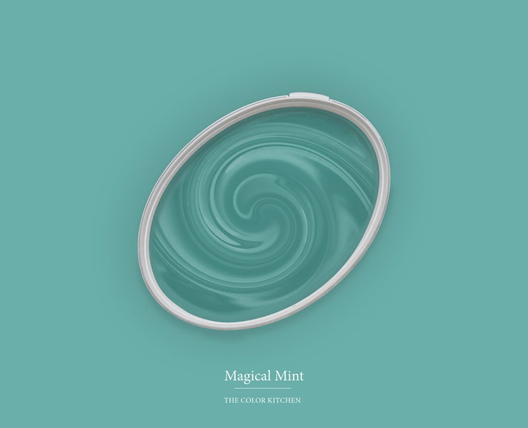 Innenwandfarbe Magical Mint von The Color Kitchen in einem Farbeimer mit Farbwirbel.