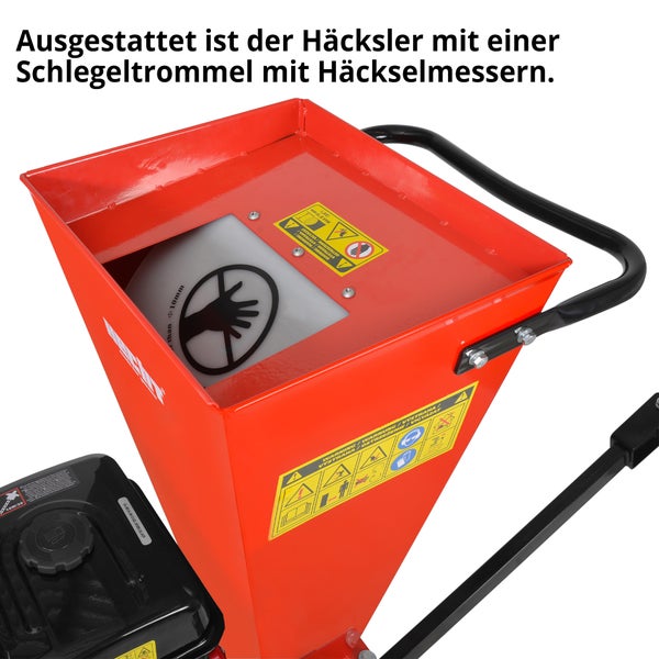 Detailansicht eines Holzhäckslers mit Schlegeltrommel und Häckselmessern.
