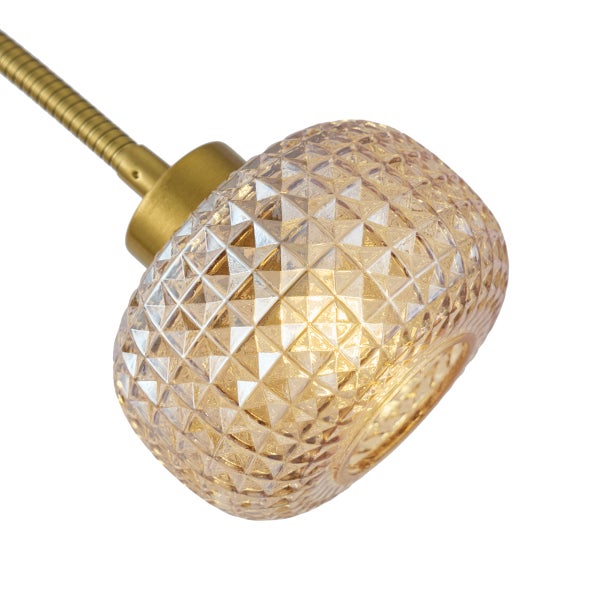 Strukturierter Lampenschirm aus Glas mit geometrischem Muster und messingfarbenem Flexarm.