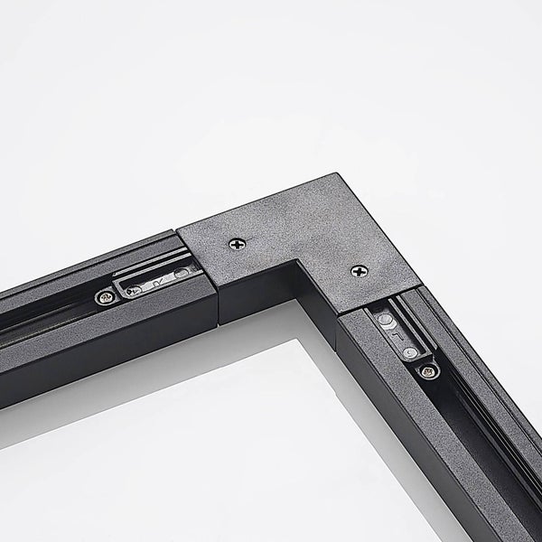Schwarzes Eck-Verbindungselement für Schienensysteme aus Metall mit sichtbaren Schrauben.