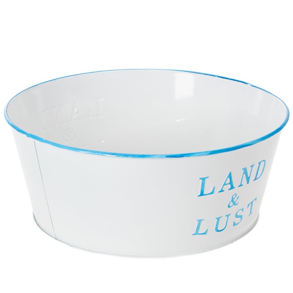 Weiße Pflanzschale aus Metall mit blauem Rand und Schriftzug Land und Lust.