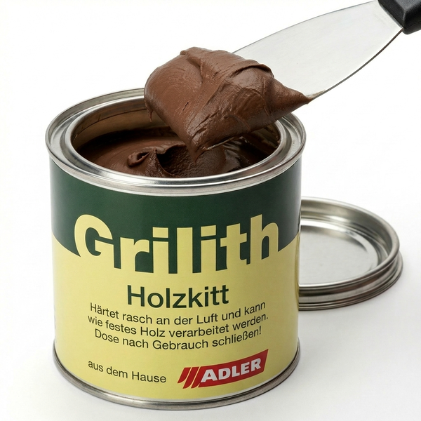 Geöffnete Dose Grilith Holzkitt mit Adler Logo, Spachtel und brauner Paste
