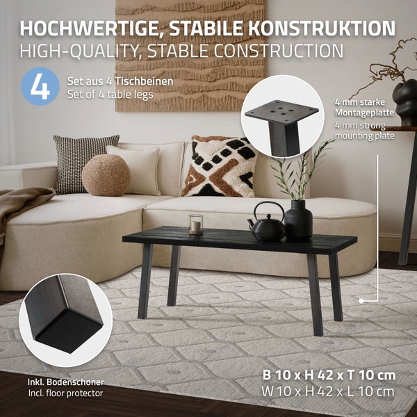 Set aus 4 schwarzen Tischbeinen, Höhe 42 Zentimeter, inklusive Bodenschonern und 4 Millimeter Montageplatte, montiert an einem Couchtisch im Wohnzimmer.