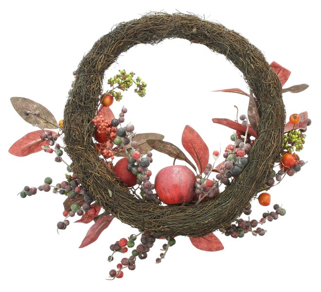 Herbstkranz mit Äpfeln, Beeren und Blättern auf einem Rebenkranz als Türschmuck oder Wanddekoration