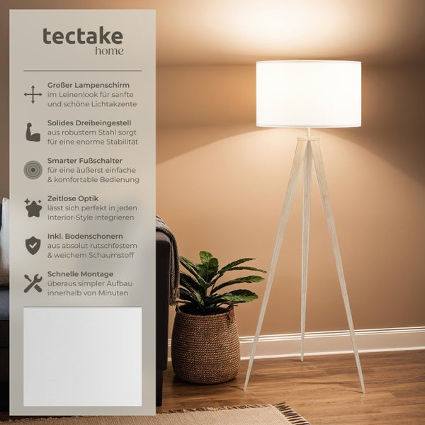 Stehlampe mit Leinenschirm und Stativ aus Stahl im Wohnzimmer.