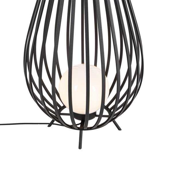 Tischleuchte mit schwarzem Metallgestell und runder Glühbirne