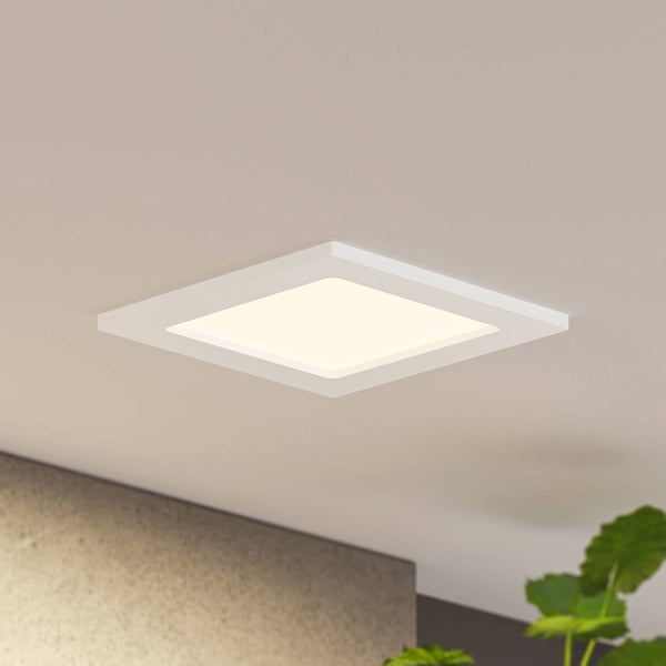 Quadratische LED-Deckenleuchte in Weiß, flaches Panel-Design, bündig an der Decke montiert.