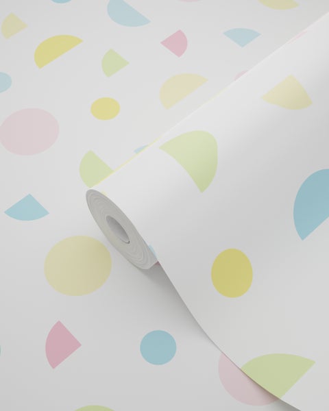 Tapetenrolle mit geometrischem Muster aus Kreisen und Halbkreisen.