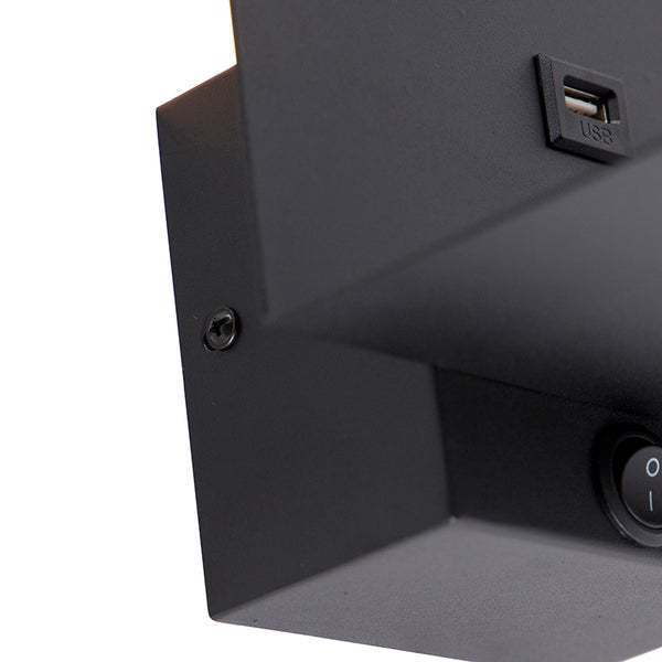 Detailaufnahme einer Leuchte mit USB Anschluss und Schalter