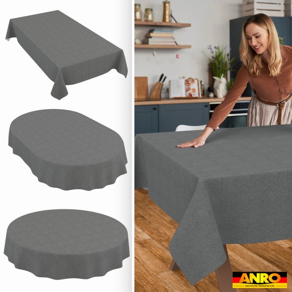 Graue strukturierte Tischdecke in rechteckiger, ovaler und runder Form, dargestellt in einer Küche. ANRO Logo.