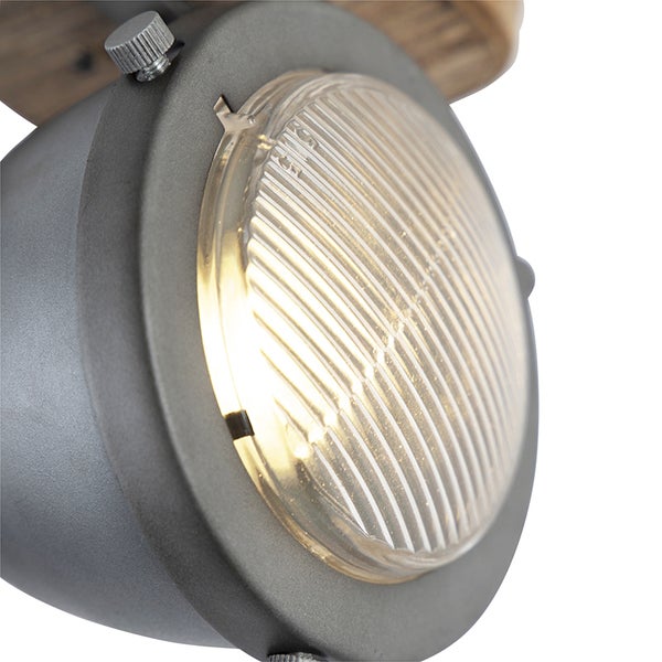 Nahaufnahme einer grauen Lampe mit geriffeltem Glas