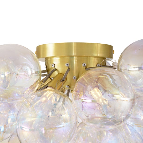 Deckenleuchte mit runden Lampenschirmen und goldenen Details