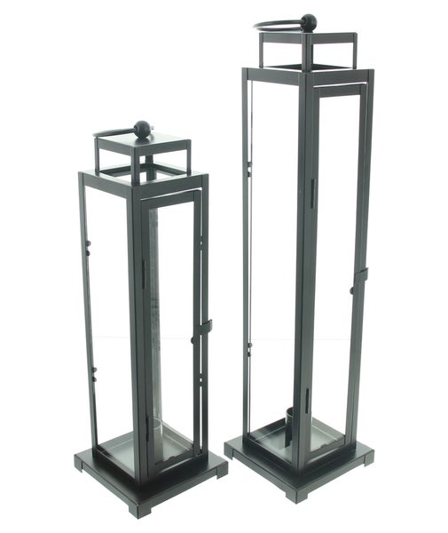 Zwei dekorative Windlichter aus Metall und Glas