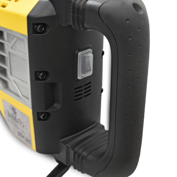 Detailansicht eines Abbruchhammers mit Griff und Schalter