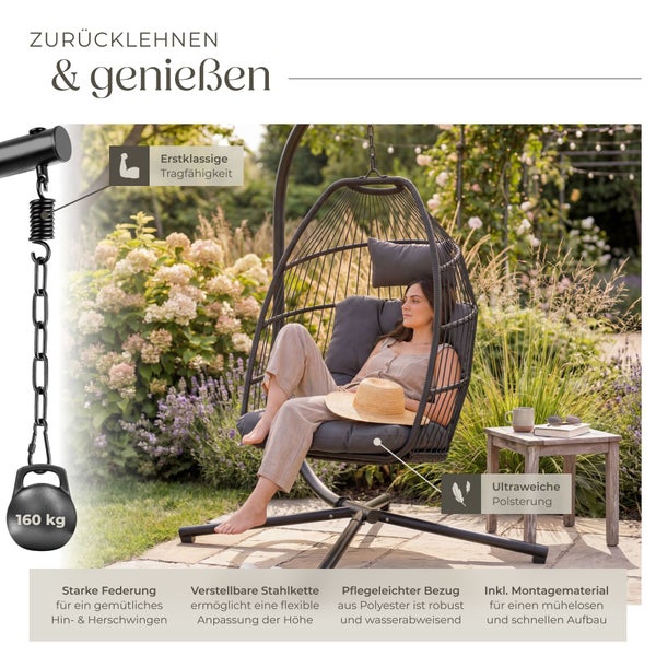 Hängesessel mit Gestell, weichen Polstern und 160 Kilogramm Tragkraft in einem Garten. Details zu Federung, Kette und Polsterung sind hervorgehoben.