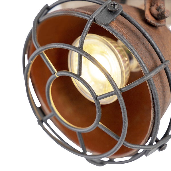 Nahaufnahme einer Deckenleuchte mit Metallkäfig