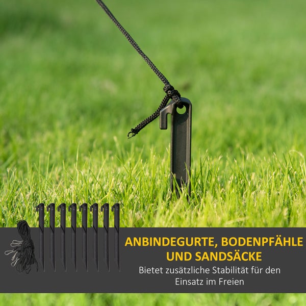 Schwarzer Bodenhering aus Kunststoff mit Seil im Rasen zur Stabilisierung im Außenbereich.