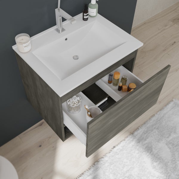 Waschtischunterschrank mit offenem Schubladensystem im modernen Badezimmer.