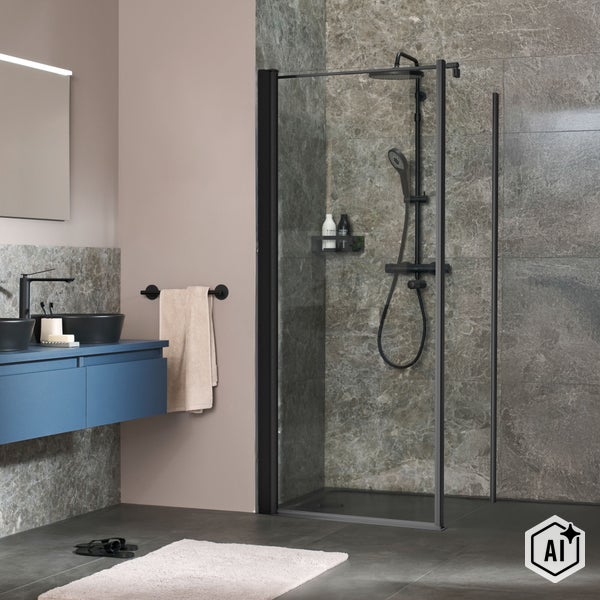 Modernes Badezimmer mit begehbarer Dusche mit schwarzem Rahmen und Regenduschsystem sowie einem blauen Waschbeckenunterschrank vor Steinfliesen.