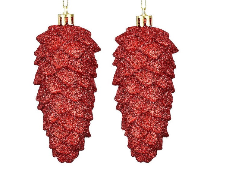 Zwei glitzernde tannenzapfenfoermige Weihnachtsbaumhaenger als Baumschmuck