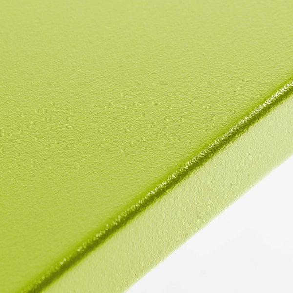 Nahaufnahme einer strukturierten grünen Oberfläche mit einer sichtbaren Kante.