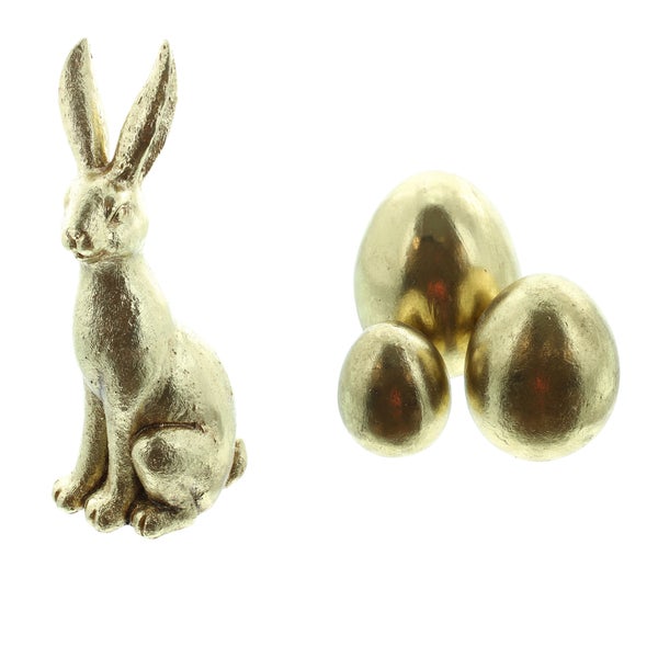 Drei goldene Dekorationskugeln in verschiedenen Größen