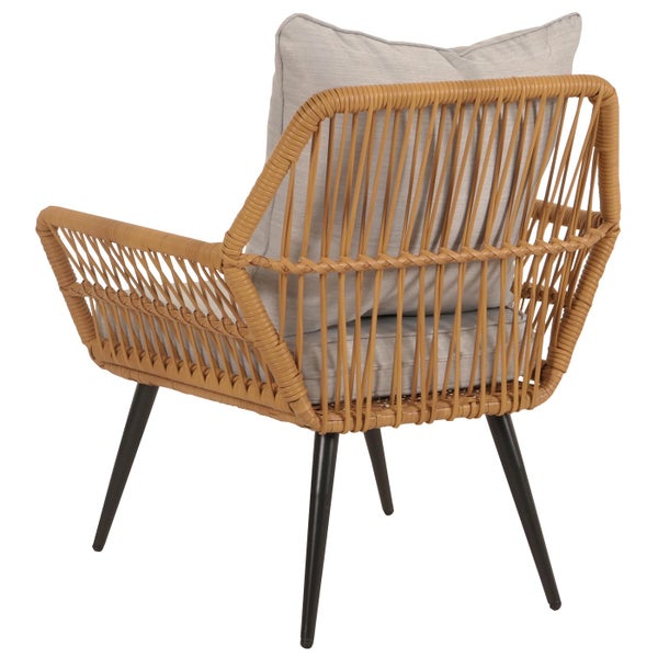 Rattan Sessel mit Polster und schwarzen Beinen von hinten