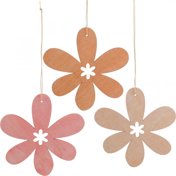 Drei hölzerne Blumenschmuckstücke mit Aufhängeschnüren