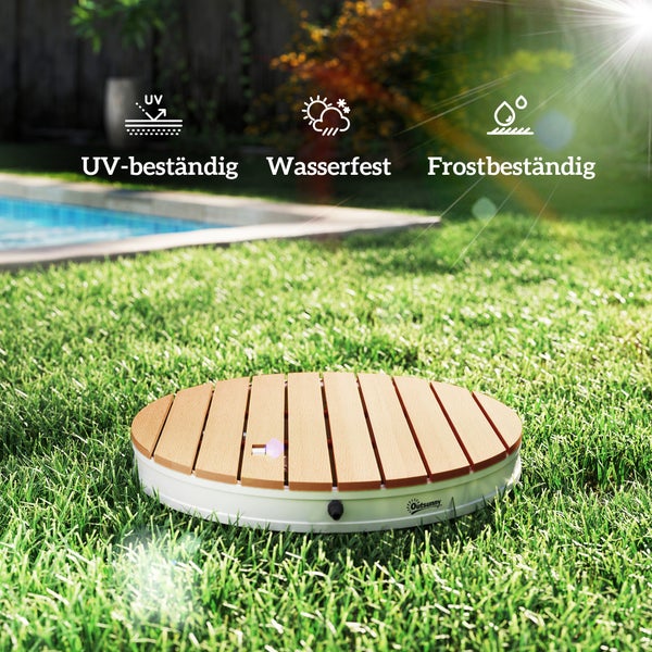 Runde Bodenplatte für Gartendusche aus Holzimitat auf Rasen, UV-beständig, wasserfest und frostbeständig.