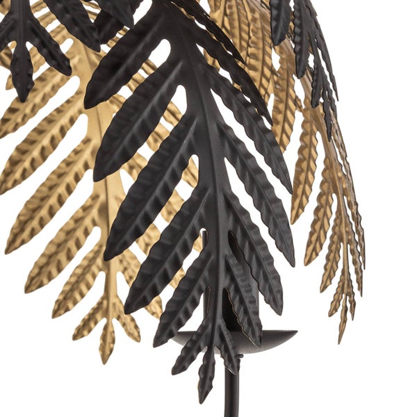 Dekorative Kerzenhalter mit Metallblättern