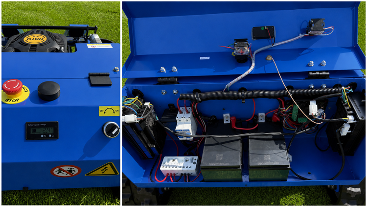 Außen- und Innenansicht der blauen Rato Steuereinheit mit Batterien, Verkabelung, Not-Aus-Schalter, Warnhinweisen und Digitalanzeige für die Spannung.