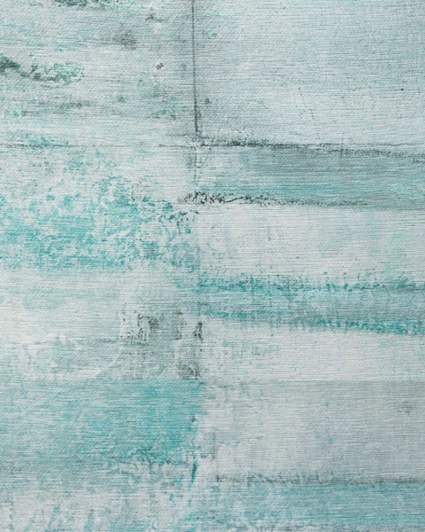Teppich in Blau und Grau mit abstraktem Vintage-Muster und fein gerippter Struktur.