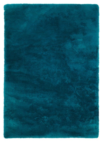 Rechteckiger Hochflor-Teppich in Petrol mit weicher, strukturierter Oberfläche.